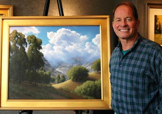 Dave Dalton with one of his landscapes
